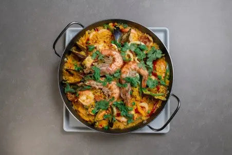 The-Heart-of-Spanish-Cuisine-El-Socarrat-Paella-Rice-and-PetitsTrésors-Signature-Ingredients petitstresors