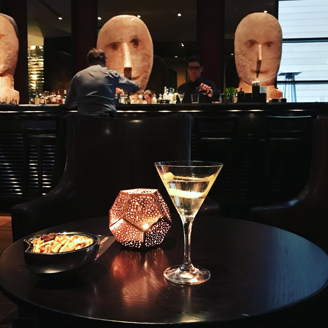 Picture of cocktail in a glass on a bar table