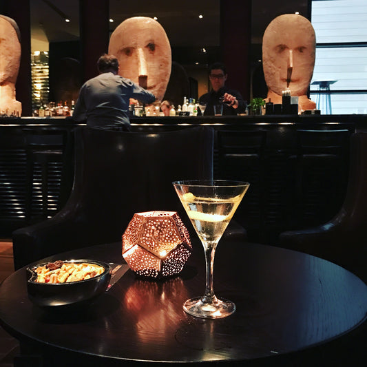 Picture of cocktail in a glass on a bar table