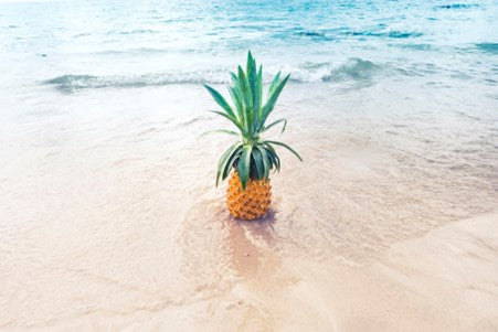 picture of pineapple on a beach