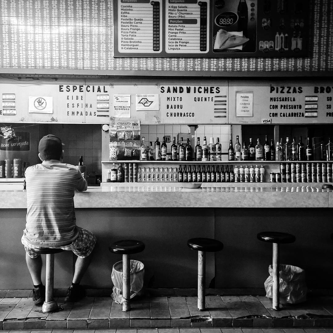 picture of person sitting at a bar